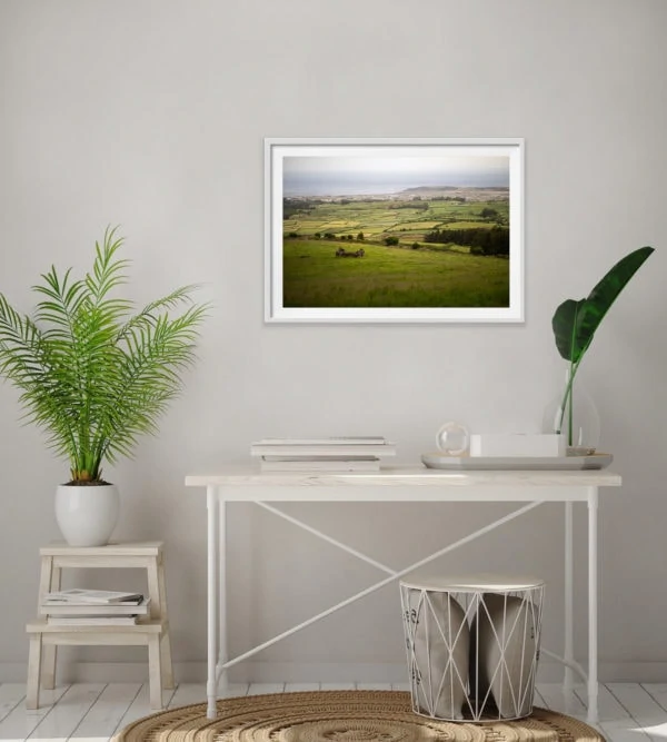 Azorean patchwork of farm fields in the Azores, Portugal. Framed in white
