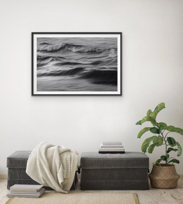 Abstract black and white photo of the ocean in a black frame