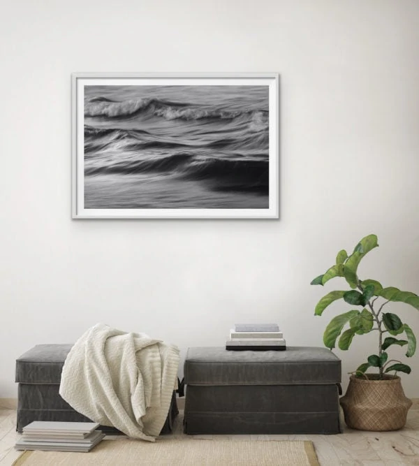 Abstract black and white photo of the ocean in a white frame