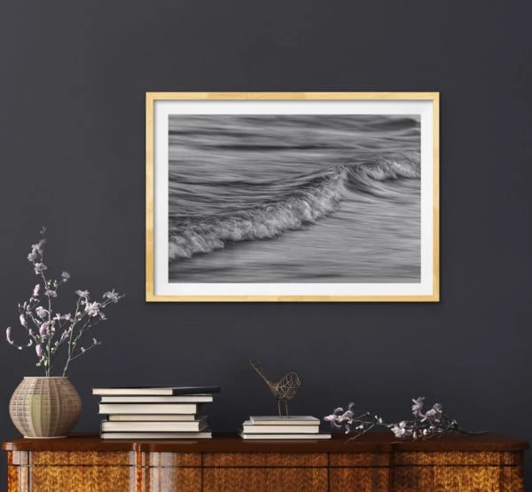 Abstract black and white photo of the ocean in a Tasmanian oak frame