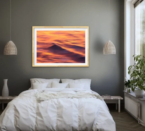Fire & Water II - an abstract image of sunset reflected on the waves of the ocean framed in Tasmanian oak