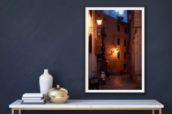 Old town - a night time street scene in the old town of Rovinj, Croatia. Framed in black