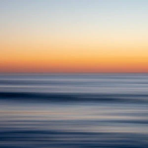 An abstract photo of the ocean which resembles brushstrokes
