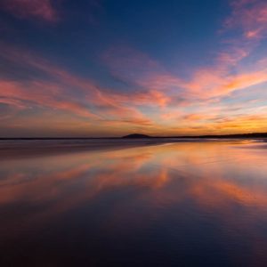 Sunset reflections at Seven Mile Beach