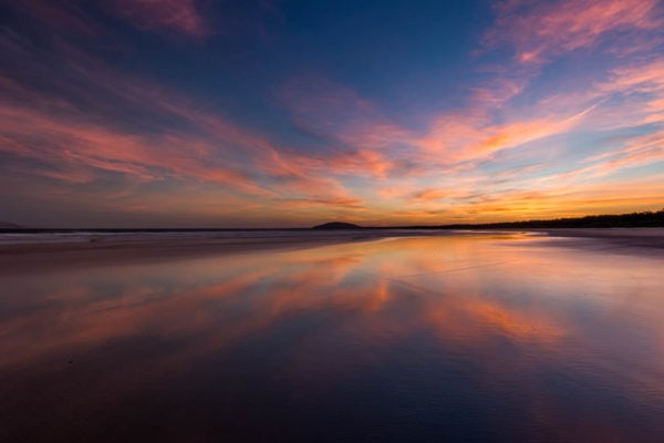Sunset reflections at Seven Mile Beach