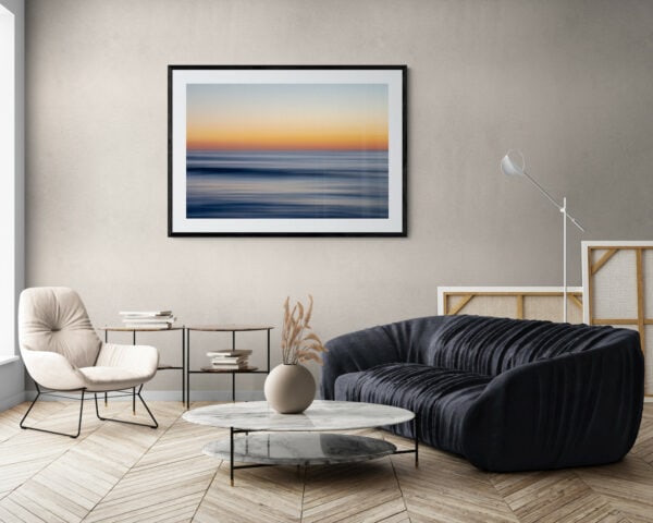 An abstract photo of the ocean which resembles brushstrokes. Framed in black