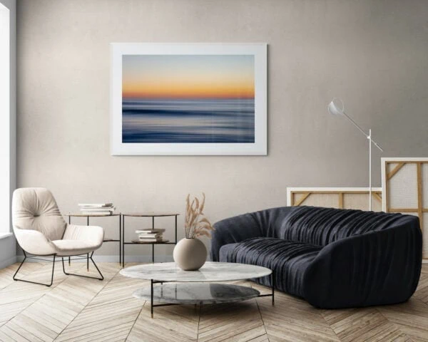 An abstract photo of the ocean which resembles brushstrokes. Framed in white
