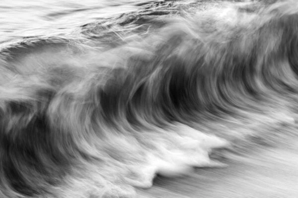 The ocean’s movement - textures resembling charcoal sketches.